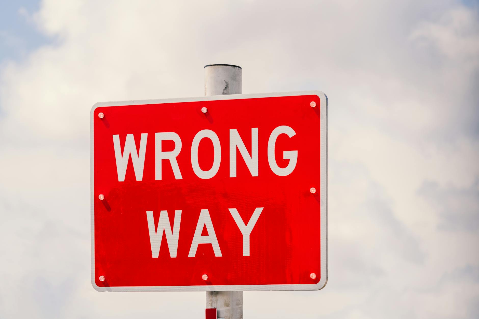 bright red wrong way traffic sign in miami